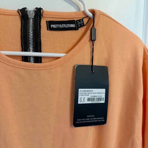 Pretty Little Things Peach Short Sleeve Jump Suit Romper Timber Size 8 - Picture 2 of 3